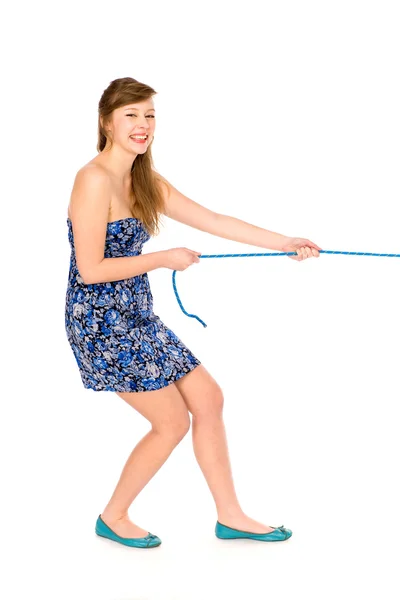 Girl pulling a rope — Stock Photo, Image
