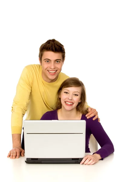 Couple using laptop Royalty Free Stock Images