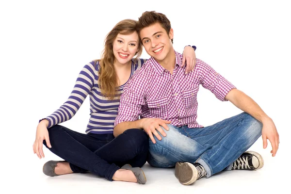 Young couple sitting Royalty Free Stock Images