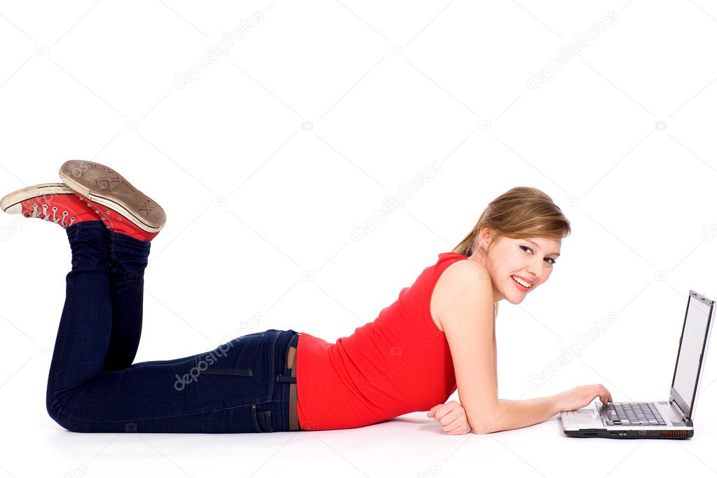 Girl lying down with laptop Stock Photo by ©pikselstock 27896417
