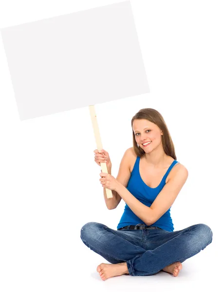 Young woman holding blank poster — Stock Photo, Image