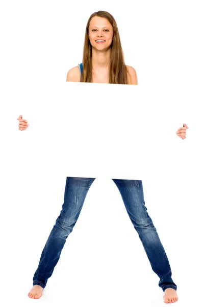 Young woman holding blank poster — Stock Photo, Image