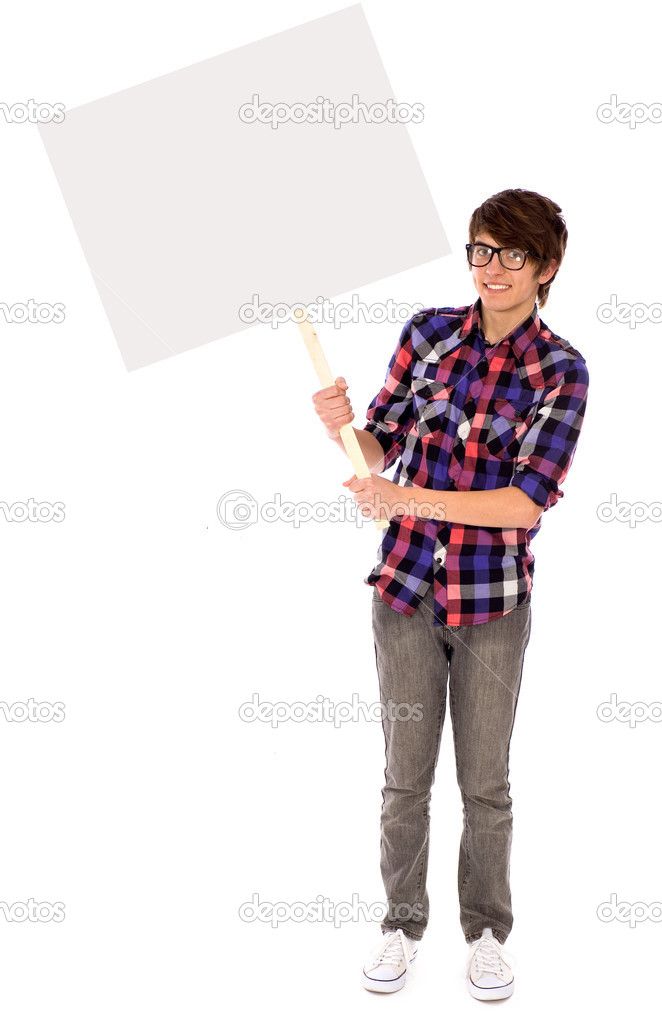 Teenager holding blank poster