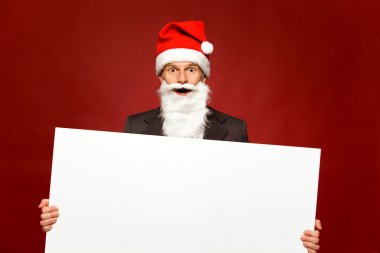 Santa holding boş poster