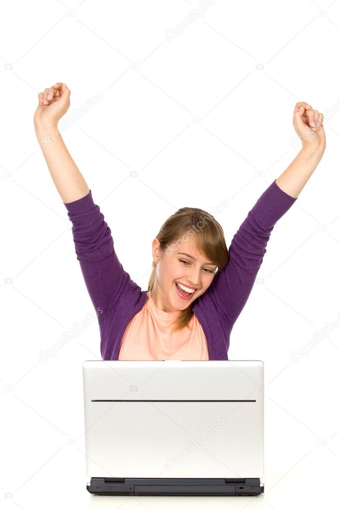 Excited woman with laptop
