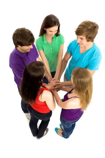 Friends putting hands together — Stock Photo, Image