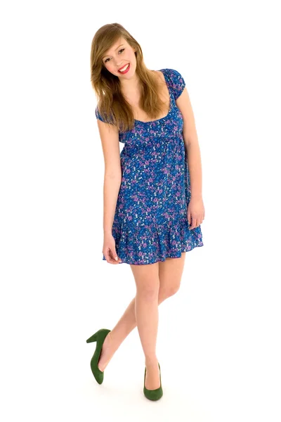 Mooi meisje in blauwe jurk Stockfoto