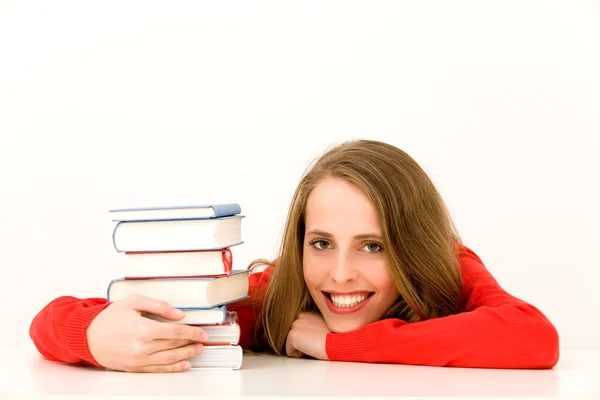 Ragazza adolescente con pila di libri — Foto Stock