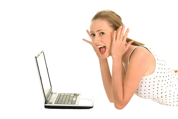 Surprised woman using laptop — Stock Photo, Image