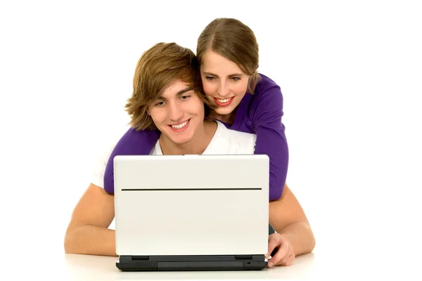 Coppia di adolescenti con laptop Foto Stock