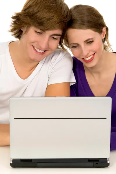 Teenage couple with laptop Royalty Free Stock Images