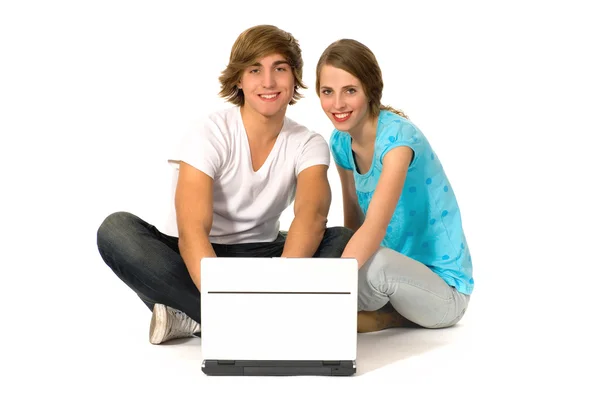 Casal adolescente com laptop Fotografia De Stock