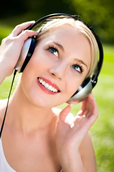 Woman with headphones — Stock Photo, Image