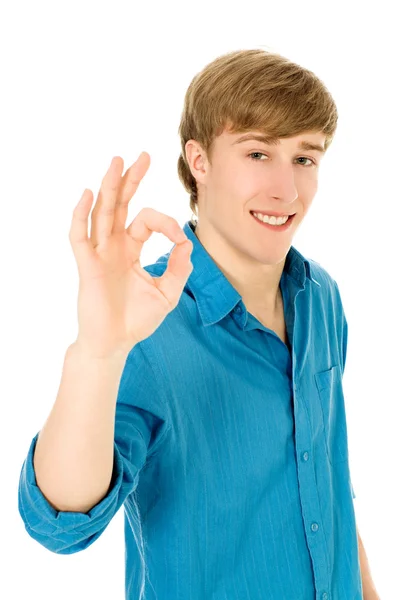 Young man making OK sign — Stock Photo, Image