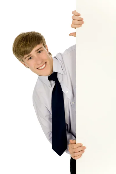 Businessman holding blank poster — Stock Photo, Image