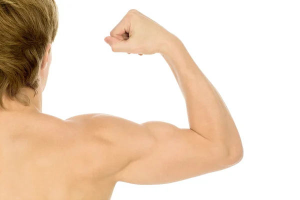 Homem bíceps de flexão — Fotografia de Stock