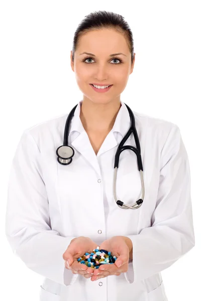 Doctor with handful of pills — Stock Photo, Image