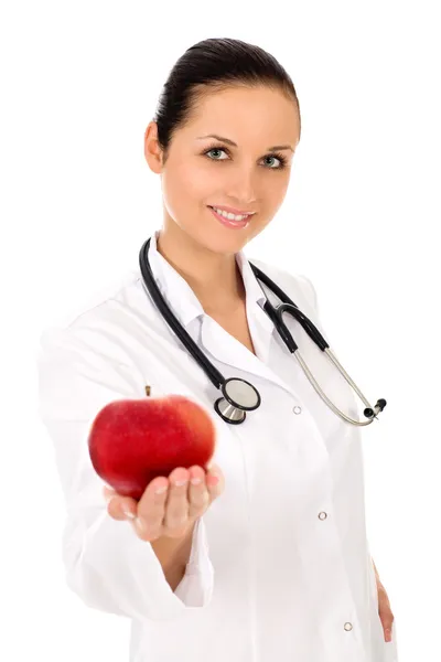 Γυναίκα γιατρό εκμετάλλευση μήλο — Φωτογραφία Αρχείου