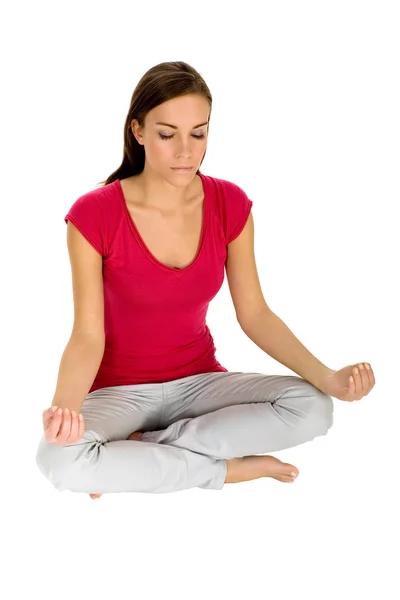 Mujer joven haciendo yoga Fotos de stock libres de derechos