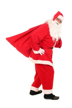 Noel Baba Noel hediye çanta taşıyor