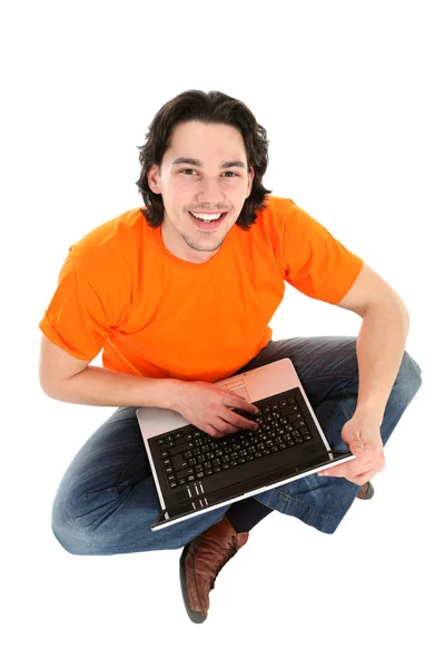 Mladý muž pomocí notebooku — Stock fotografie