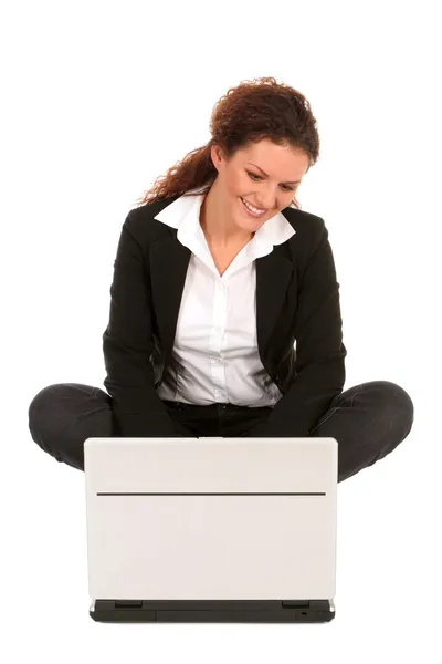 Businesswoman sitting with laptop — Stock Photo, Image