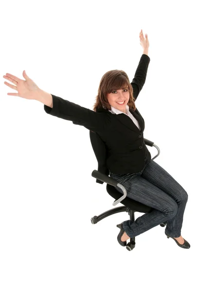 Happy businesswoman sitting on an office chair — Stock Photo, Image