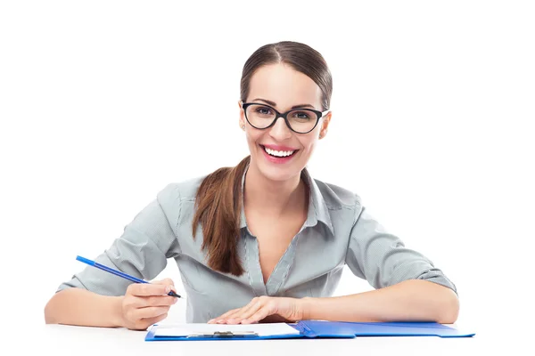 Woman working at table Stock Image