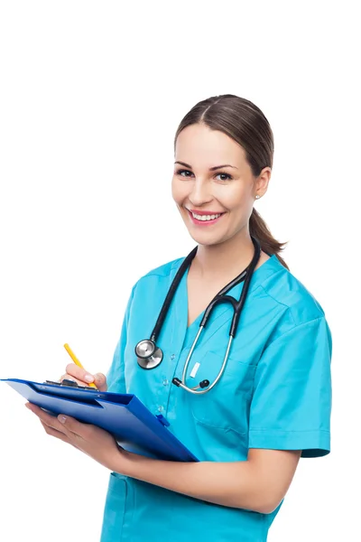 Female doctor holding a clipboard — Stock Photo, Image