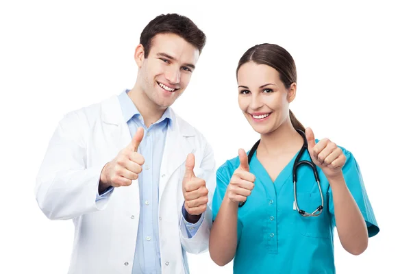 Vriendelijke mannelijke en vrouwelijke artsen — Stockfoto