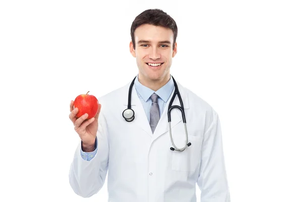 Doctor sosteniendo una manzana —  Fotos de Stock