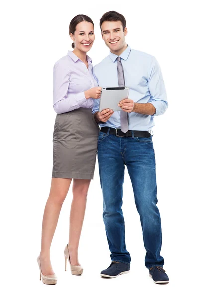 Coworkers looking at digital tablet — Stock Photo, Image