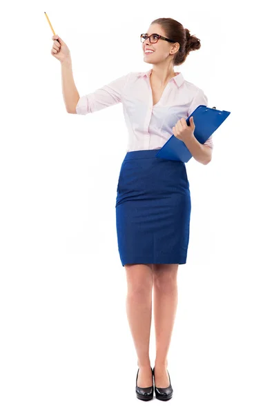 Affärskvinna pekar med penna — Stockfoto