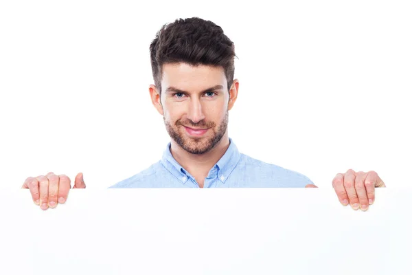 Man and blank poster — Stock Photo, Image