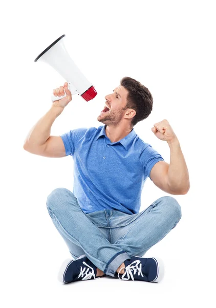 Muž křičí přes megafon — Stock fotografie