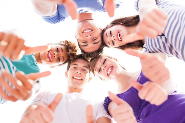 Friends showing thumbs up — Stock Photo, Image