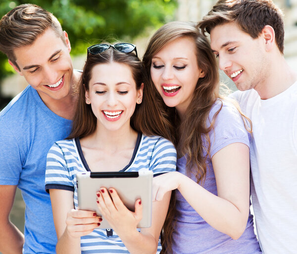 Students with tablet computer