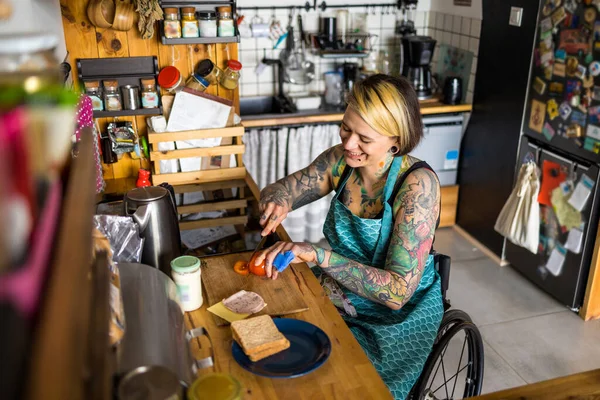 Woman Wheelchair Preparing Food Kitchen Home — Foto de Stock