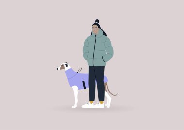 Genç bir dişi Asyalı tazı sahibi evcil hayvanlarıyla yürüyor, kış mevsimi, köpek kıyafetleri.