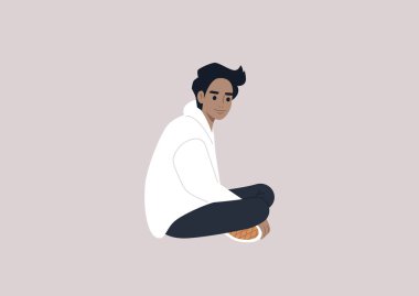 A young male Caucasian character sitting on the floor with their legs crossed