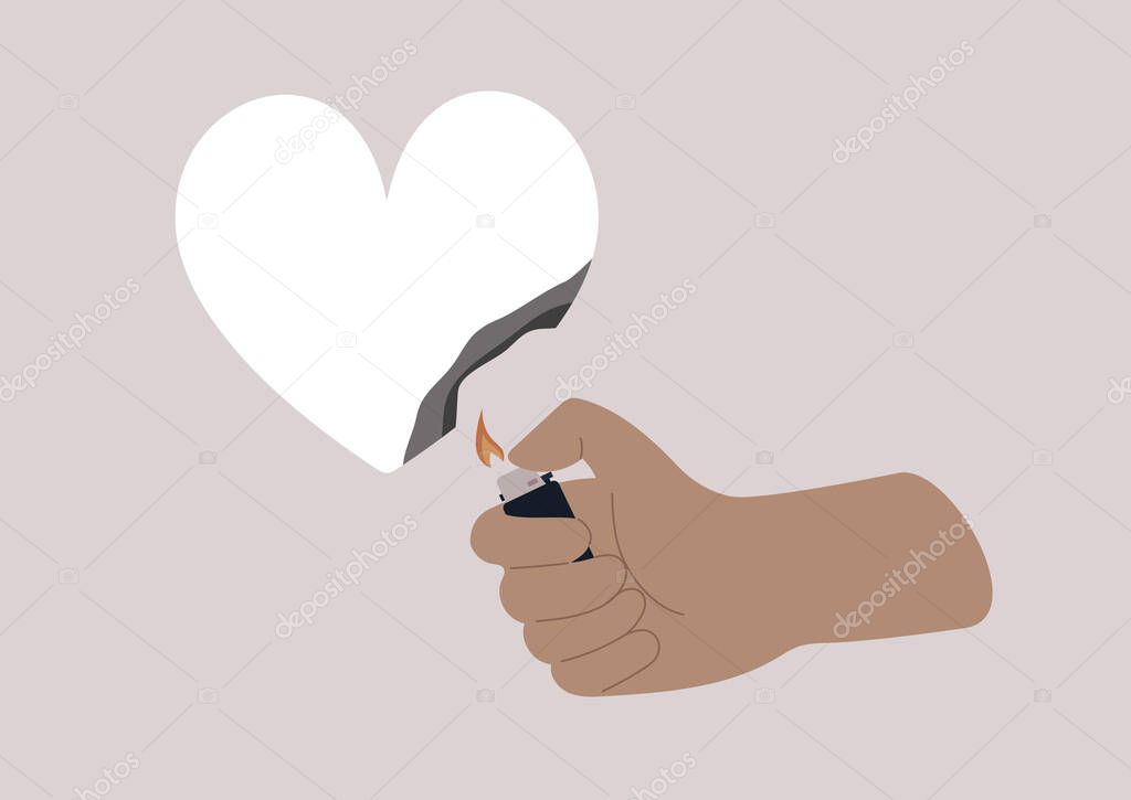 A hand burning a paper heart with a lighter, relationship difficulties