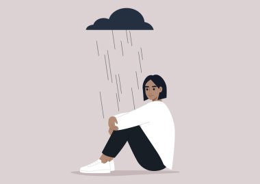 A young upset character hugging their knees, a black rain cloud hovering above them