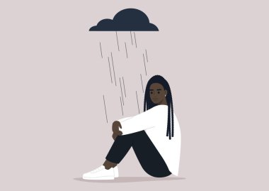 A young upset character hugging their knees, a black rain cloud hovering above them