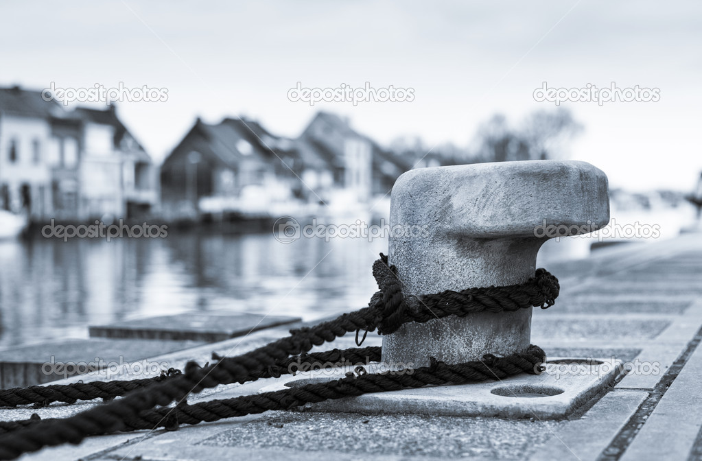 Tied down (Bollard on the dock)
