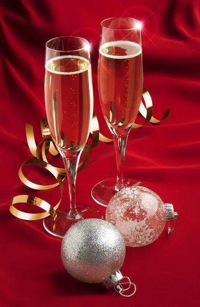 Champagne glasses with christmas decorations — Stock Photo, Image