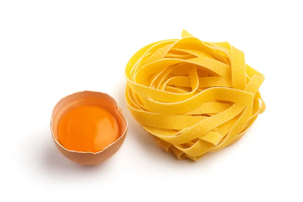 Italian pasta and half egg — Stock Photo, Image