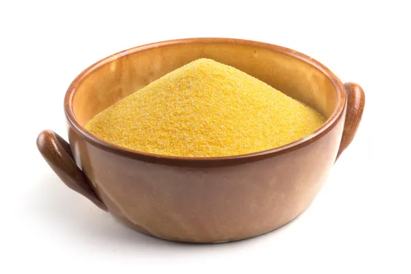 Cornmeal in bowl — Stock Photo, Image