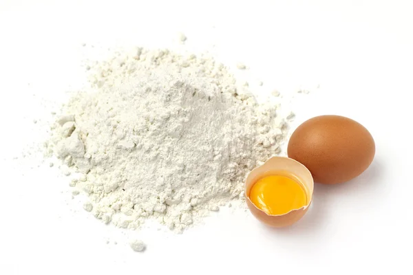 White flour and eggs isolated on white background — Stock Photo, Image