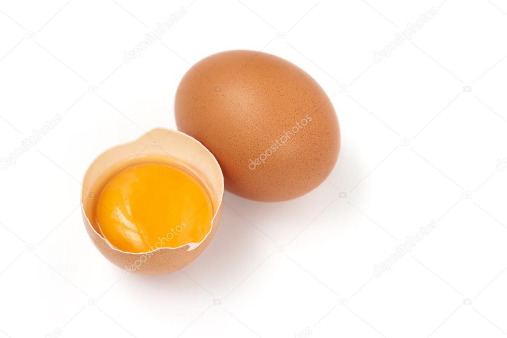 Egg yolk and whole egg isolated on white background Stock Photo by ©paulistano 24777405