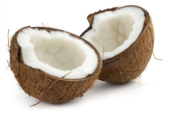 Coco cortado ao meio sobre fundo branco — Fotografia de Stock